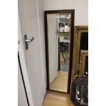 A 20th Century wall hanging dressing room mirror, together with a mahogany framed ,