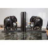 Ebony book ends in the shape of elephants