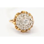 A 9ct gold cluster ring set with white stones, tiered setting, ring size N1/2,