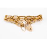 A 9ct gold gate bracelet, alternate textured and polished details, padlock clasp,