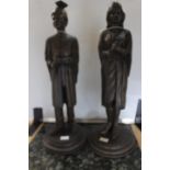 Pair of bronzed male and female scholar figures