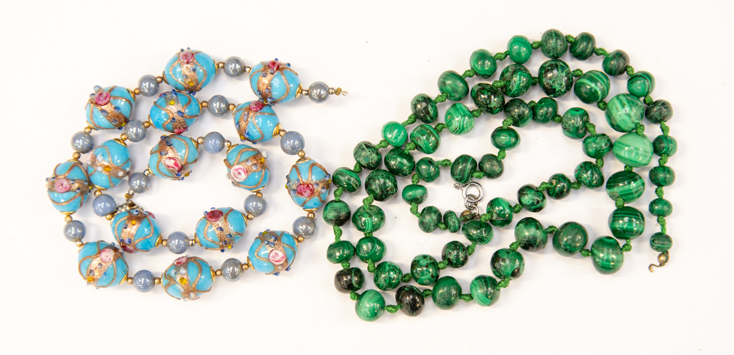 A string of graduated malachite beads (fastener AF) together with a string of Murano glass beads