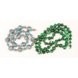 A string of graduated malachite beads (fastener AF) together with a string of Murano glass beads