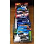 Hot Wheels cars including "Treasure Hunt" Chevelle, "Workshop" series Corvette and Toyota,