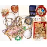 A collection of costume jewellery to include a Monet paste set necklace, glass bead necklaces,