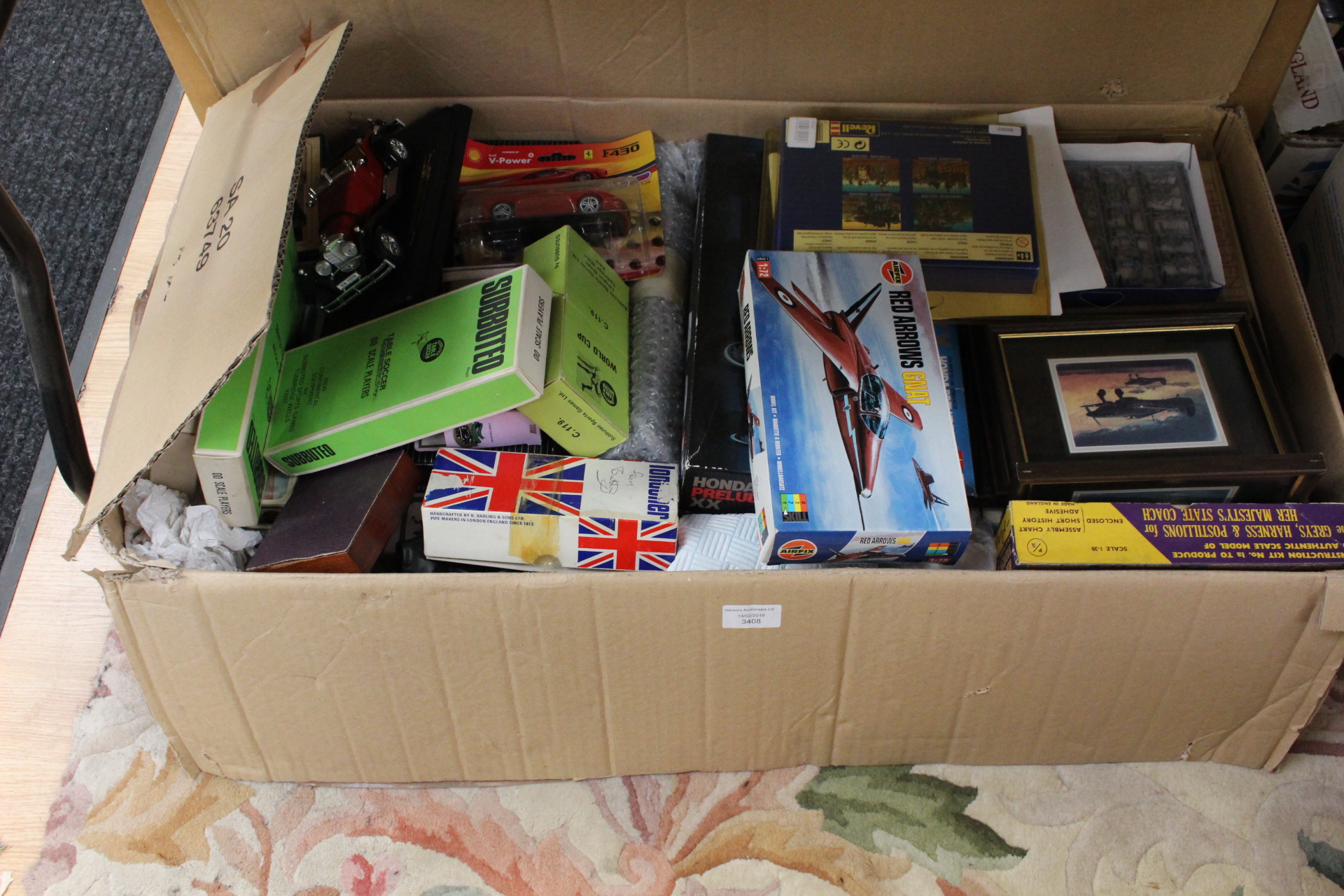 A box of toy / collectibles to be catalogued accordingly