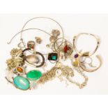 A collection of silver and white metal jewellery including cuffs, collars, stone set pendants,