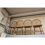 A set of four Windsor type chairs, of recent manufacture,