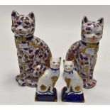 A pair of cat reproduction Staffordshire flatbacks,