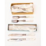 Mother of pearl handles, silver collared fish knives and matching forks,