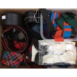 A collection of Scottish plaid knee length socks ties all in various plaids, leather belts,