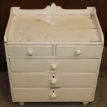 A Victorian white painted miniature chest