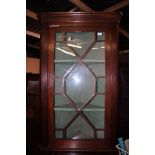 A 19th Century mahogany glazed wall hanging corner cupboard.