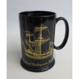 A 20th Century Wedgwood Black Glazed Tankard With Gilded decoration to Commemorate 'The Governor&