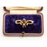 An Arts & Crafts brooch, 9ct rose gold brooch with purple set stone, total gross weight approx 2.