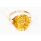 A ½ sovereign ring 1910, set in 18ct gold, size X, gross weight approx 5.