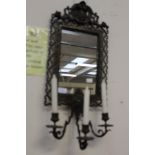Two bronze Regency style wall mirrors with candle holders