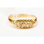 A Victorian diamond boat head ring set with five small diamonds, 18ct gold, size N,
