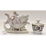 Continental pot pourri vase in the shape of a sleigh with cupid and floral decoration,