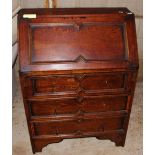 A early 20th Century oak bureau,