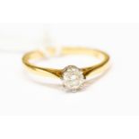 A diamond and 18ct gold ring, set with round brilliant cut diamond, approx diamond weight 0.