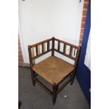 A Victorian bobbin turned corner chair