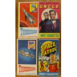 Four sweet cigarette boxes, two Thunderbirds, Man From Uncle,