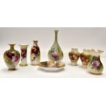 Eight pieces of Royal Worcester, varying dates, to include a miniature vase of tapering form,