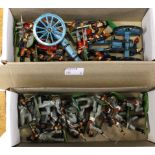 Two boxes containing metal hand painted soldiers including field cannon
