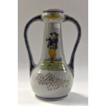 A 1930's HB Quimper twin handled vase, size 32 cms high by 22 cms diameter (including the handles).