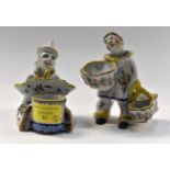 A 19th Century Amusing condiment set of a seated clown circa 19th Century 12.