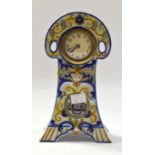An early 20th Century Fourmaintraux clock case with clock and key, circa 20th Century,