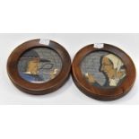 Pair of Paul Foullen Quimper woodden plates, in woodden frames.