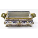 A 19th Century Fourmaintraux Frere Desvres twin handled jardiniere
