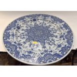 A large 19th Century blue and white Porquier beau charger, 67 cms diameter,