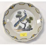 An 18th Century French Faience "La Rochelle" plate 23 cm diameter