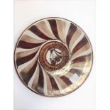 Alan Caigar Smith. Tin glazed plate with personal painted mark. Width 26cm