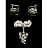 Georg Jensen (attributed) - a Danish modernist brooch with stylised grapes, suspended from foliate