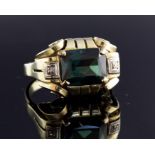 Art deco style 14ct. yellow gold and green tourmaline dress ring, the openwork mount in the Art Deco