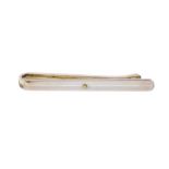 Georg Jensen - a Danish modernist silver tie bar, number 200, with a single gold bead to centre,