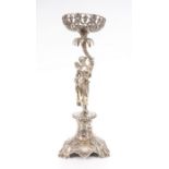 A mid Victorian silver table centrepiece, pierced basket over a winged angel sheltering under a palm