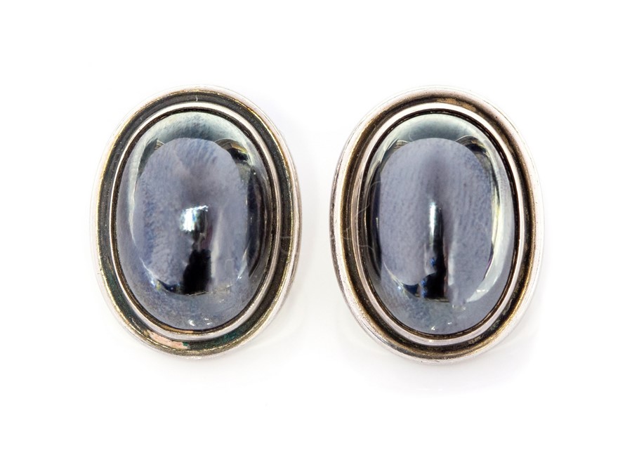 Georg Jensen - Harald Nielsen for Georg Jensen, a pair of Danish modernist silver and hematite '