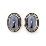 Georg Jensen - Harald Nielsen for Georg Jensen, a pair of Danish modernist silver and hematite '