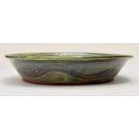 Penny Simpson (1949 -). Earthenware slip floral bowl. Width 31cm x Height 6cm