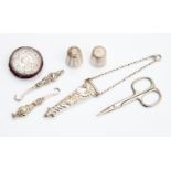 A collection of silver sewing implements, to include a chatelaine scissor case, Birmimgham 1893,