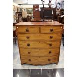 An early 19th Century bow fronted mahogany chest of drawers,