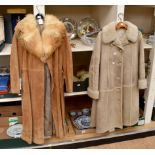 A beige sheepskin coat in a sheepskin lining - collar and turned backed cuffs,