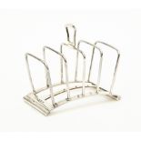 ***WITHDRAWN*** An Art Deco silver 5 bar toast rack; Hukin & Heath Birmingham, 1935. 4.57 ozt / 142.