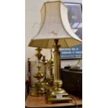 Four brass table lamps
