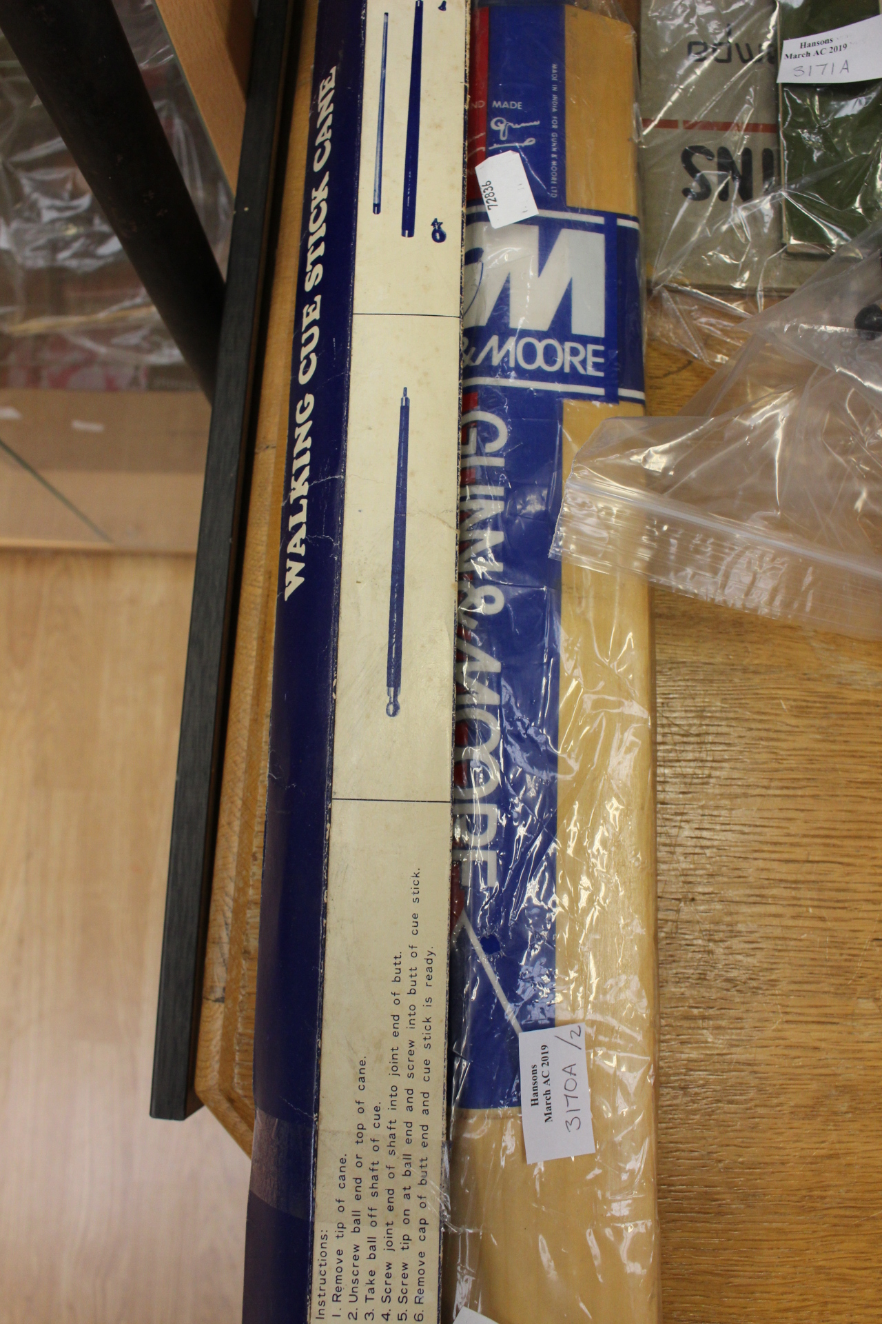 Gun & Moore scoremaster cricket bat, with cast soldiers and plastic animals,